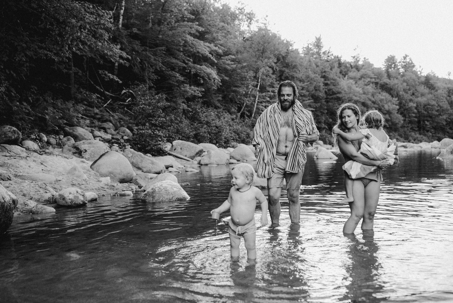 Family portraits in a river in Maine