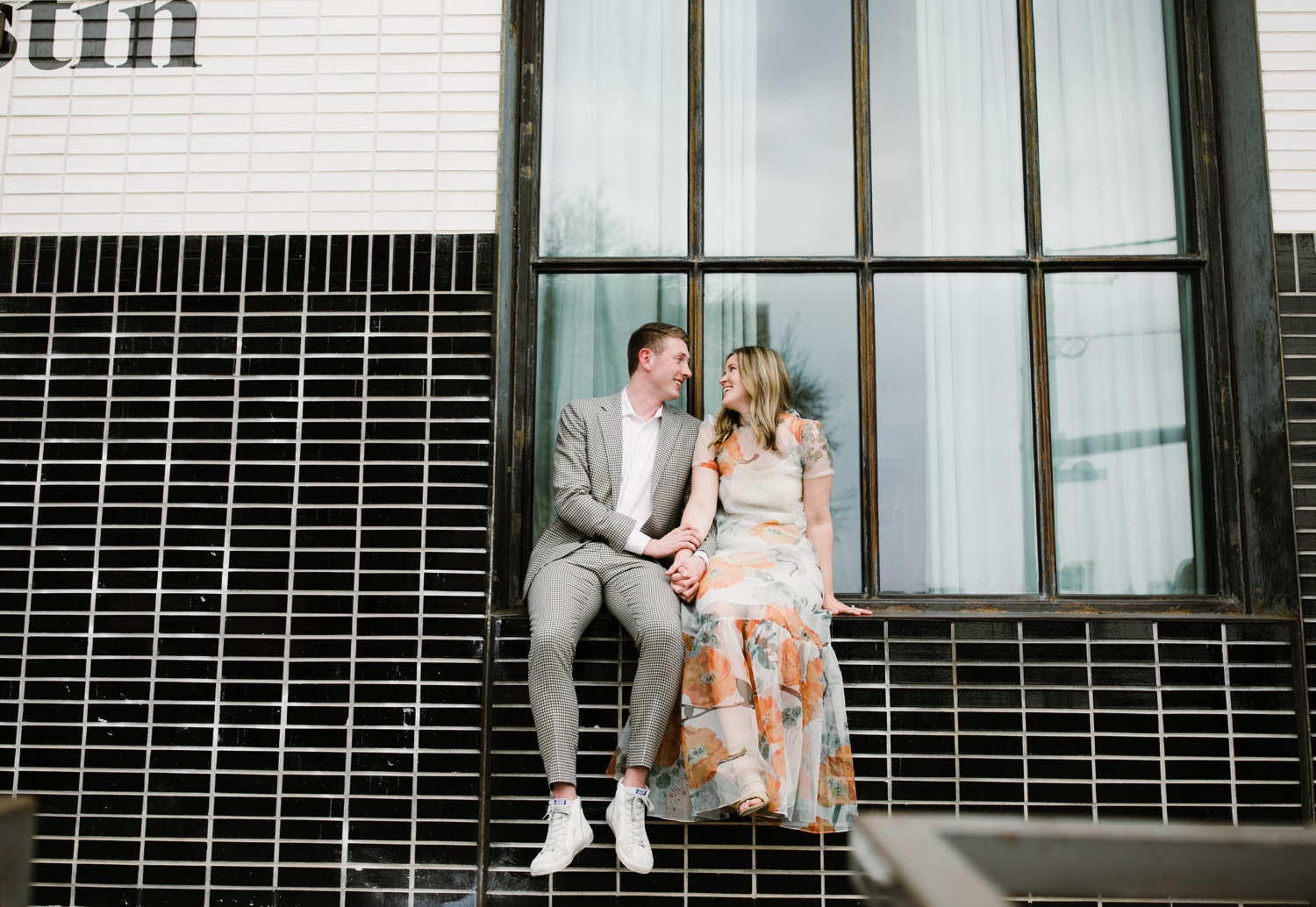 Bride in an aqua and coral maxi dress for her engagement session at South Congress Hotel