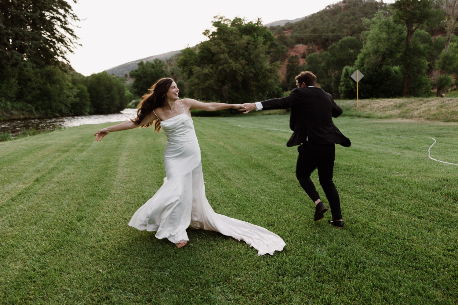 bride and groom in Aspen field