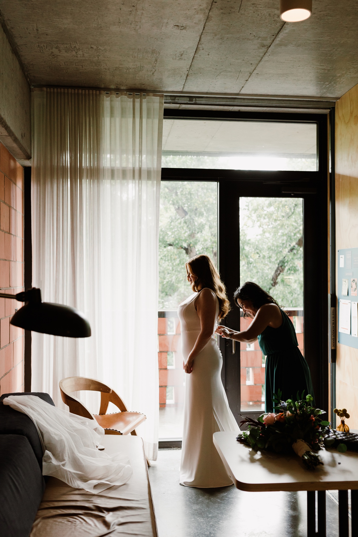 Bride getting ready for her Austin elopement at Carpenter Hotel