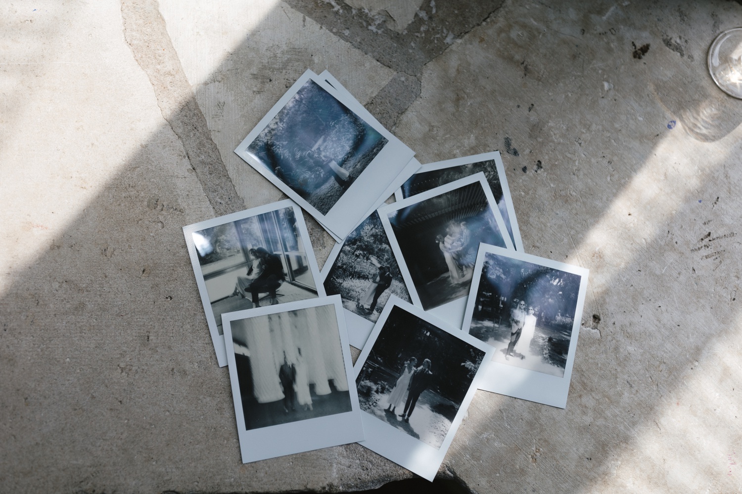 Black and white Polaroid photos taken at an intimate Austin wedding by Amber Vickery