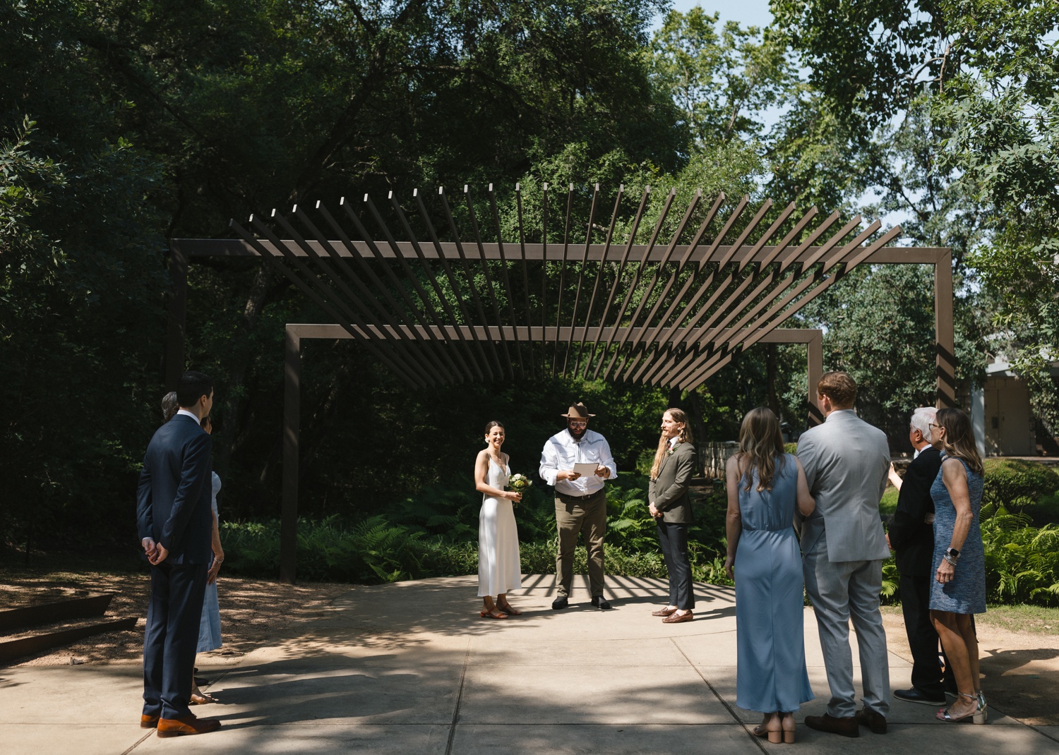 Outdoor wedding ceremony at the UMLAUF Sculpture Garden