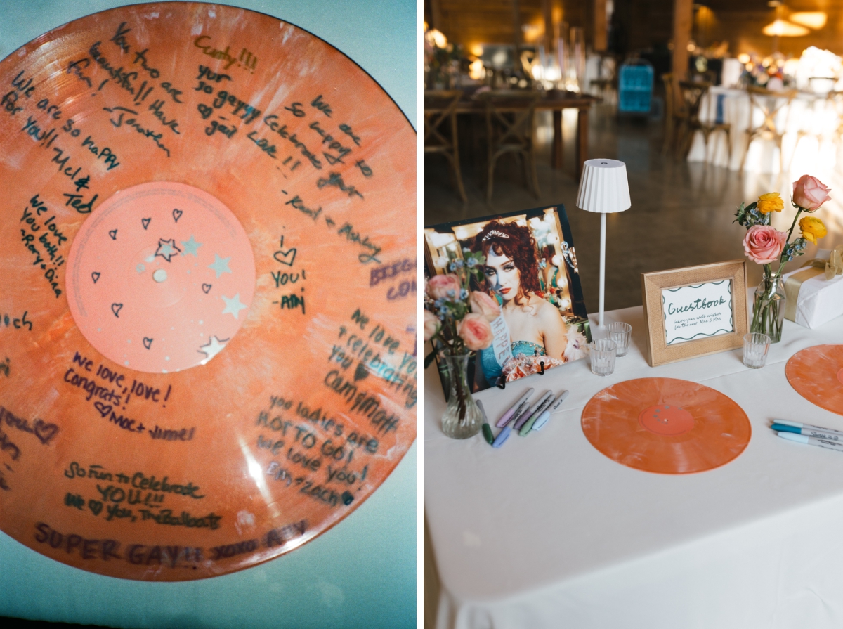 Wedding guests sign an orange Chappell Roan vinyl as a guest book at this wedding reception at The Addison Grove