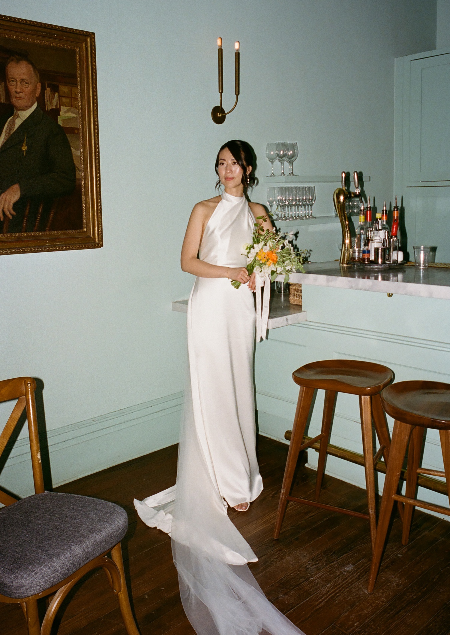 Film portrait of a bride in the barroom at Mattie's Green Pastures