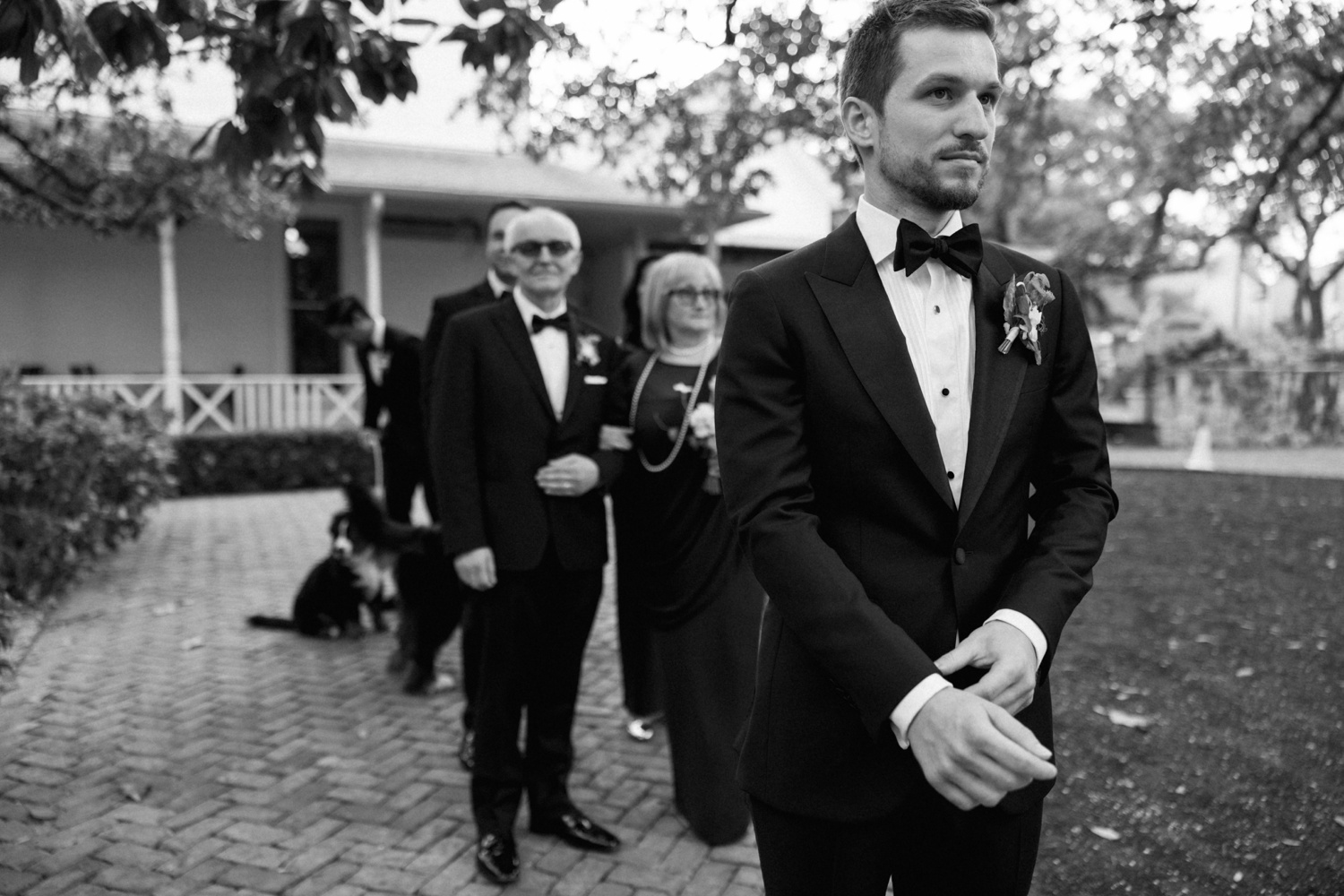 Groom processing into his wedding ceremony
