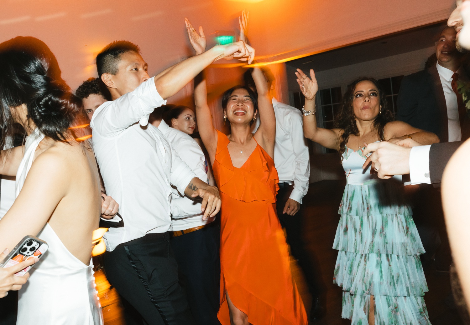 Wedding guests dancing at Mattie's Green Pastures