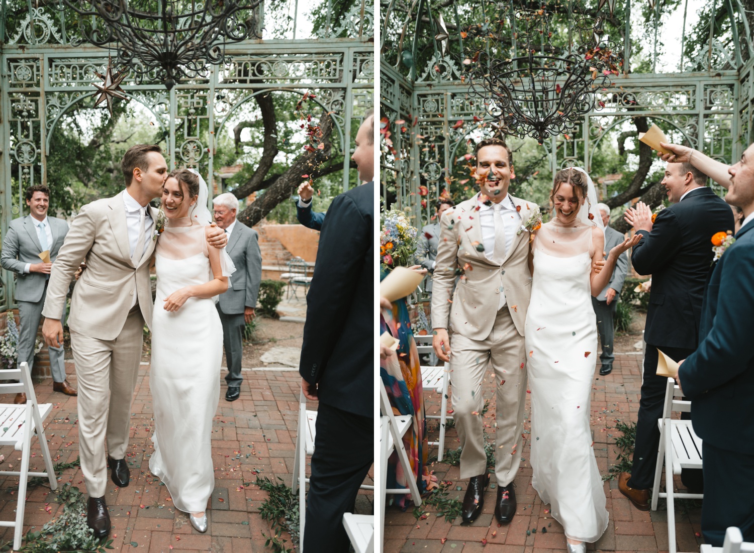 Wedding guests throwing flower petals on the bride and groom