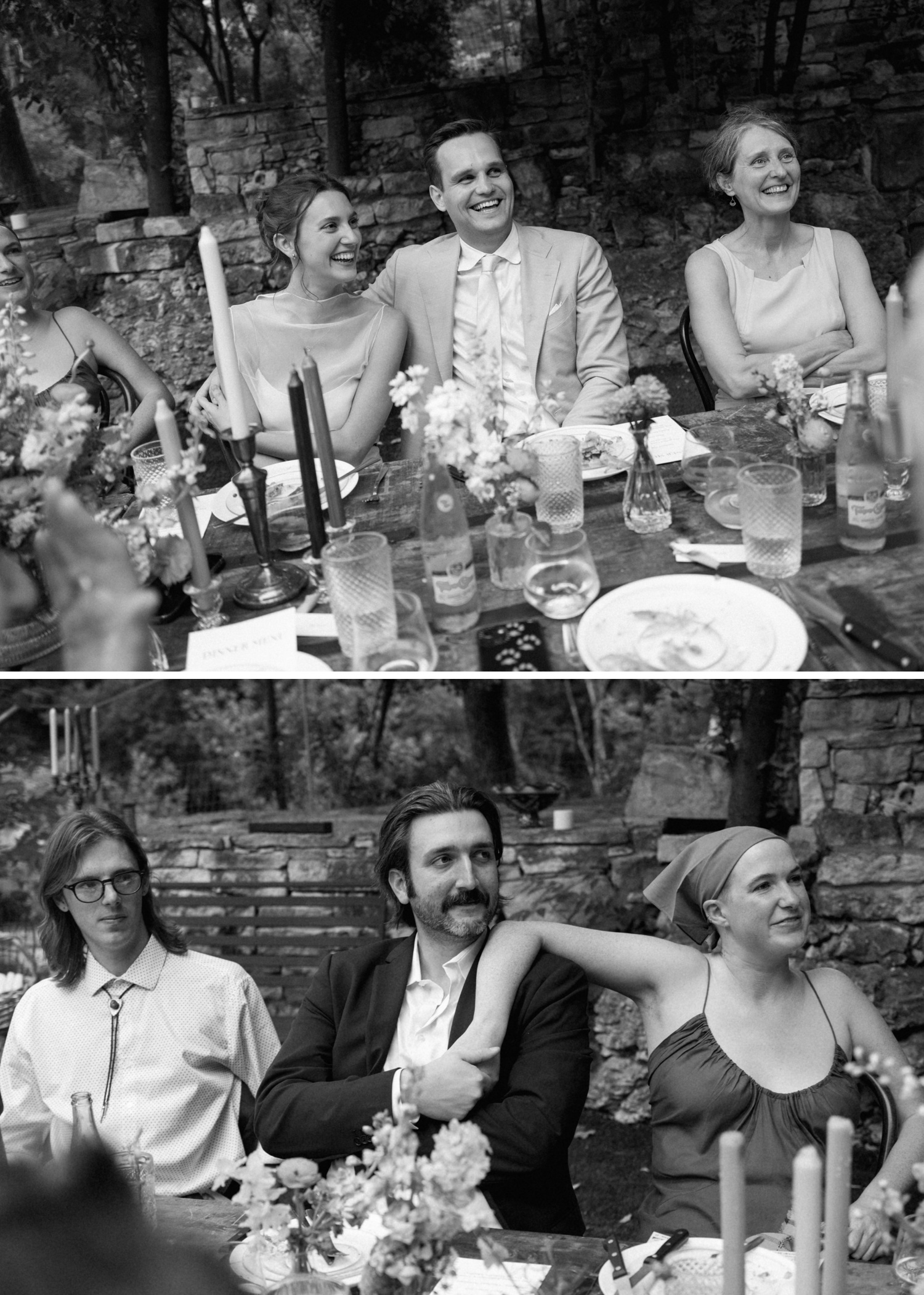 Bride and groom laughing while listening to a speech at their wedding reception