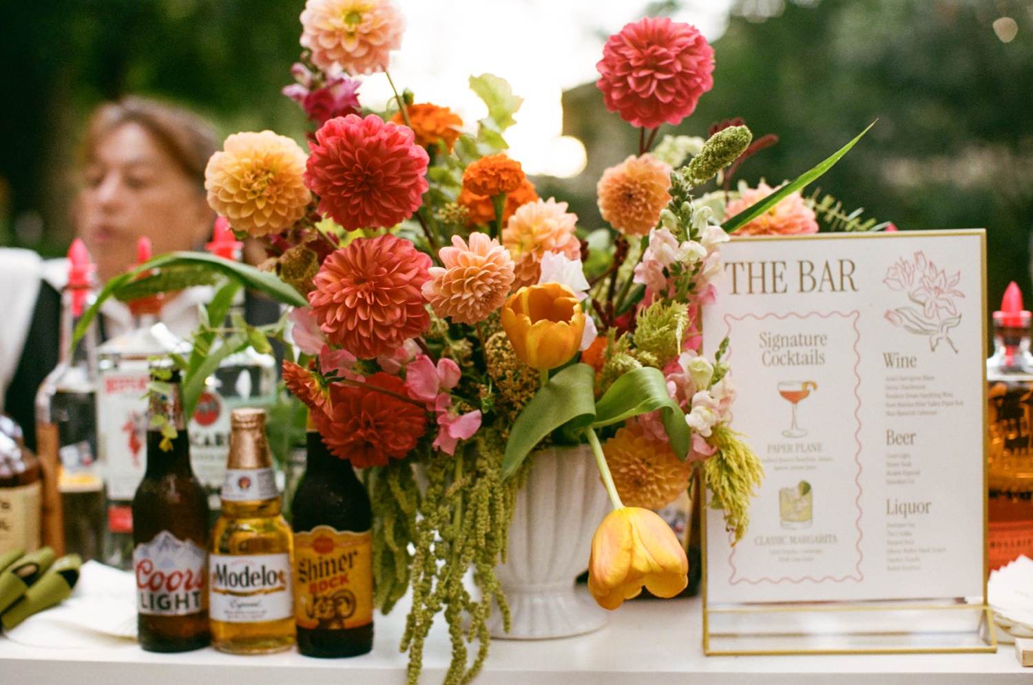 Yellow, orange, and fuchsia wedding flowers by Earl Grey Floral