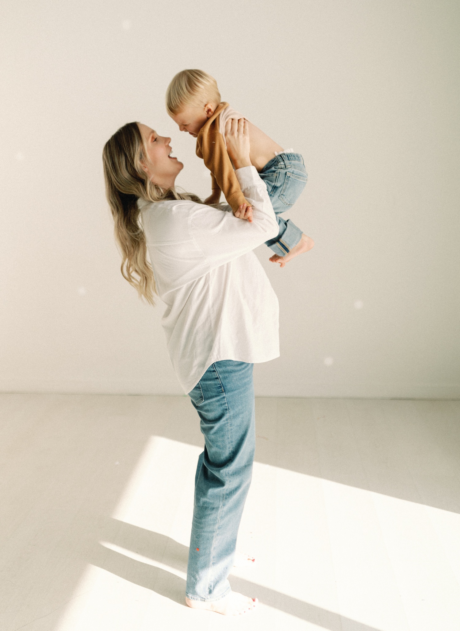 Family joining mama for studio portraits during their maternity and newborn bundle experience
