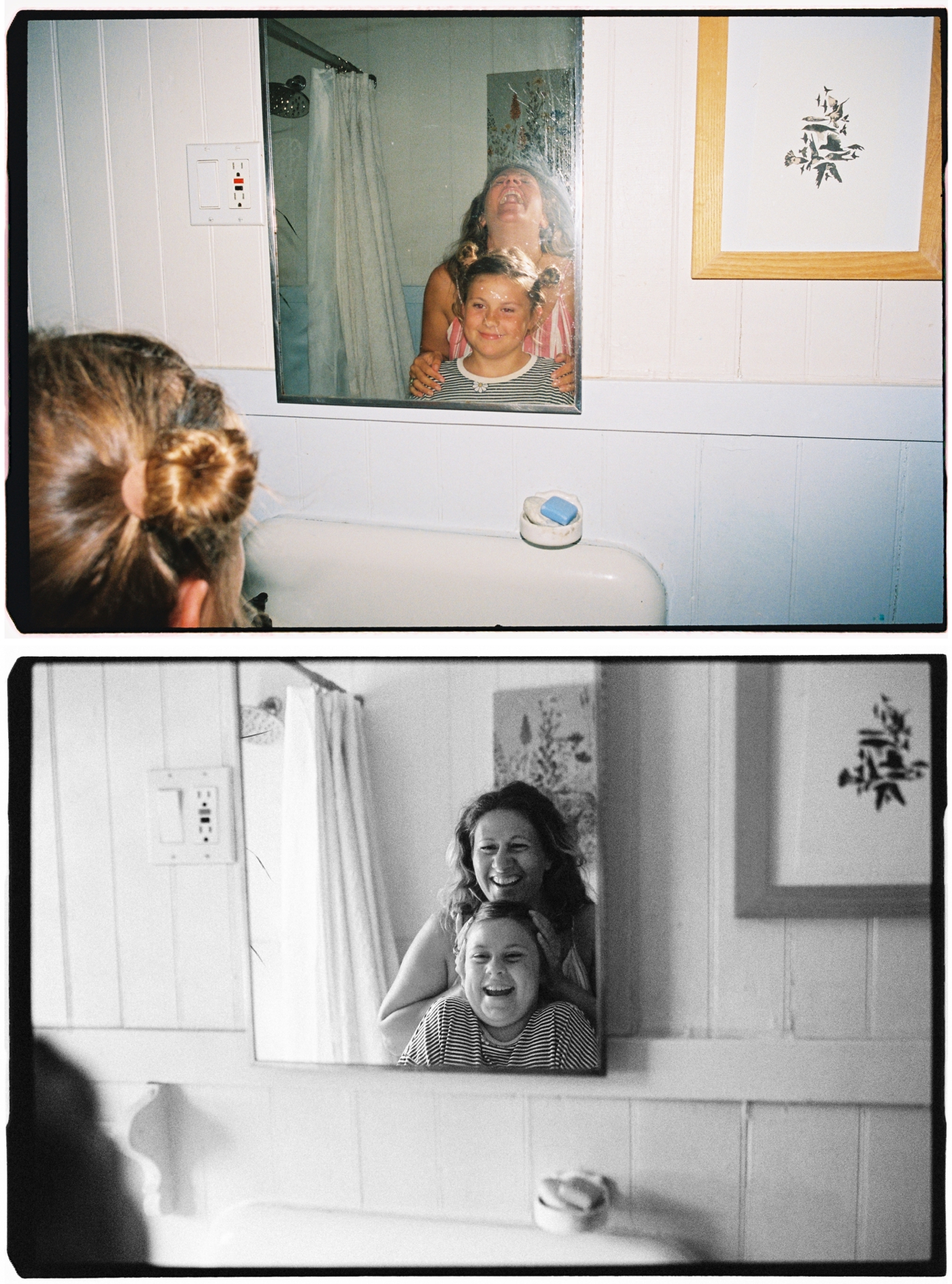 Mother doing her daughter's hair in the bathroom mirror